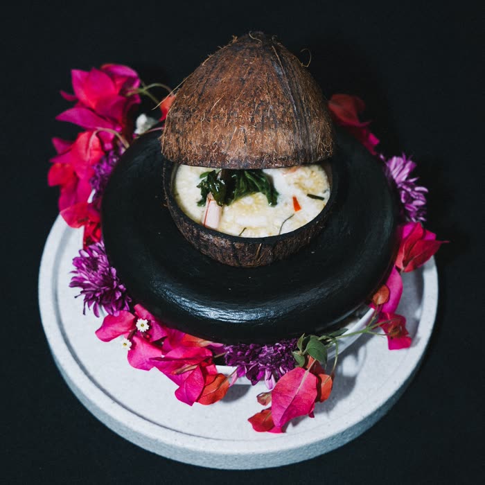 A course served inside a coconut shell